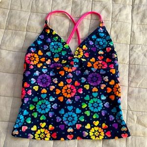 Selling this bikini top for ages 10-12 large